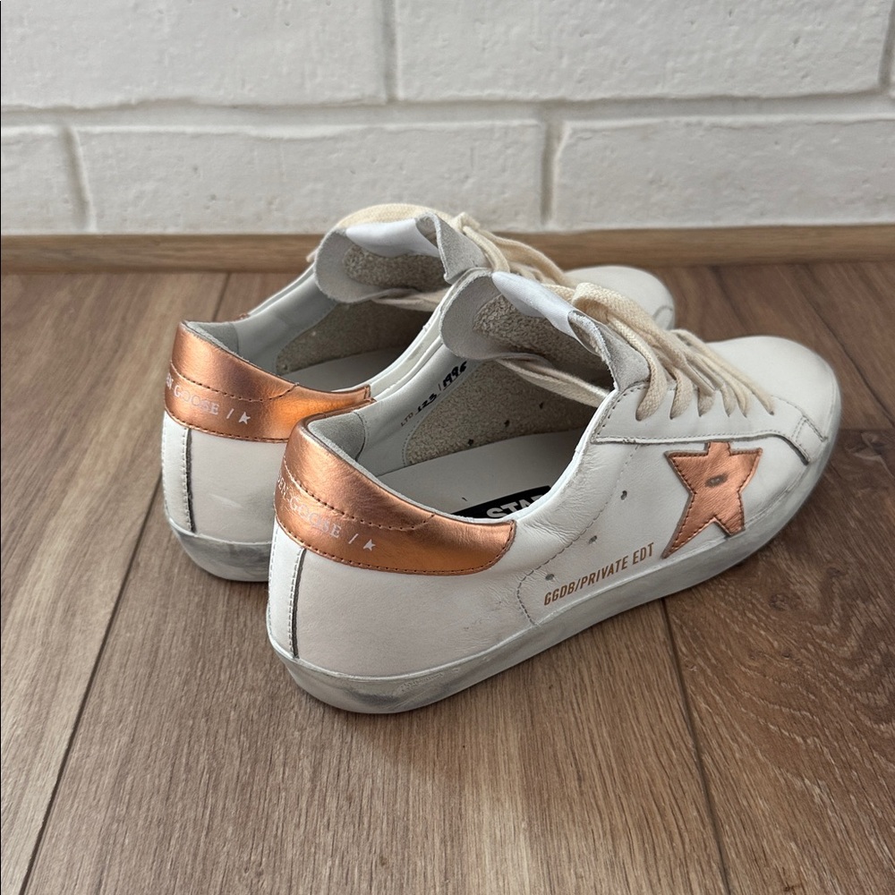 White Sneakers with Copper Star Detail